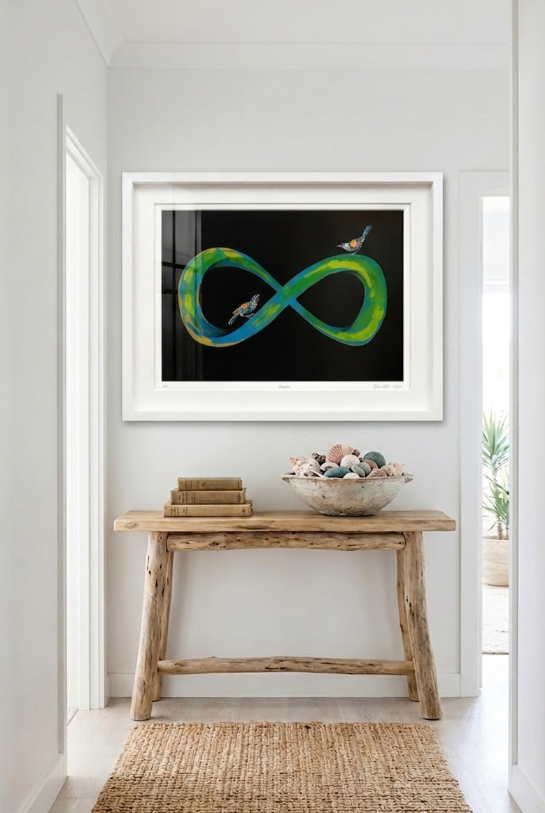 Blue, yellow, green and gold infinity symbol art with black background in a modern home