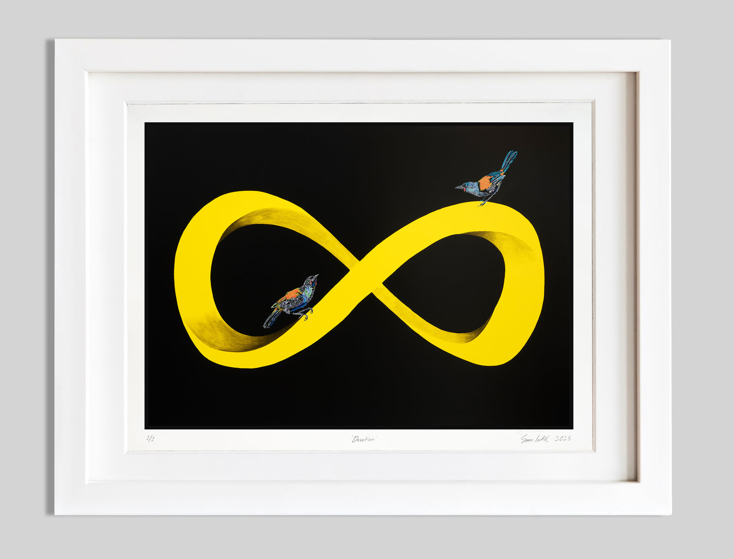 Yellow infinity symbol with two birds on a black background and situated in a white frame.