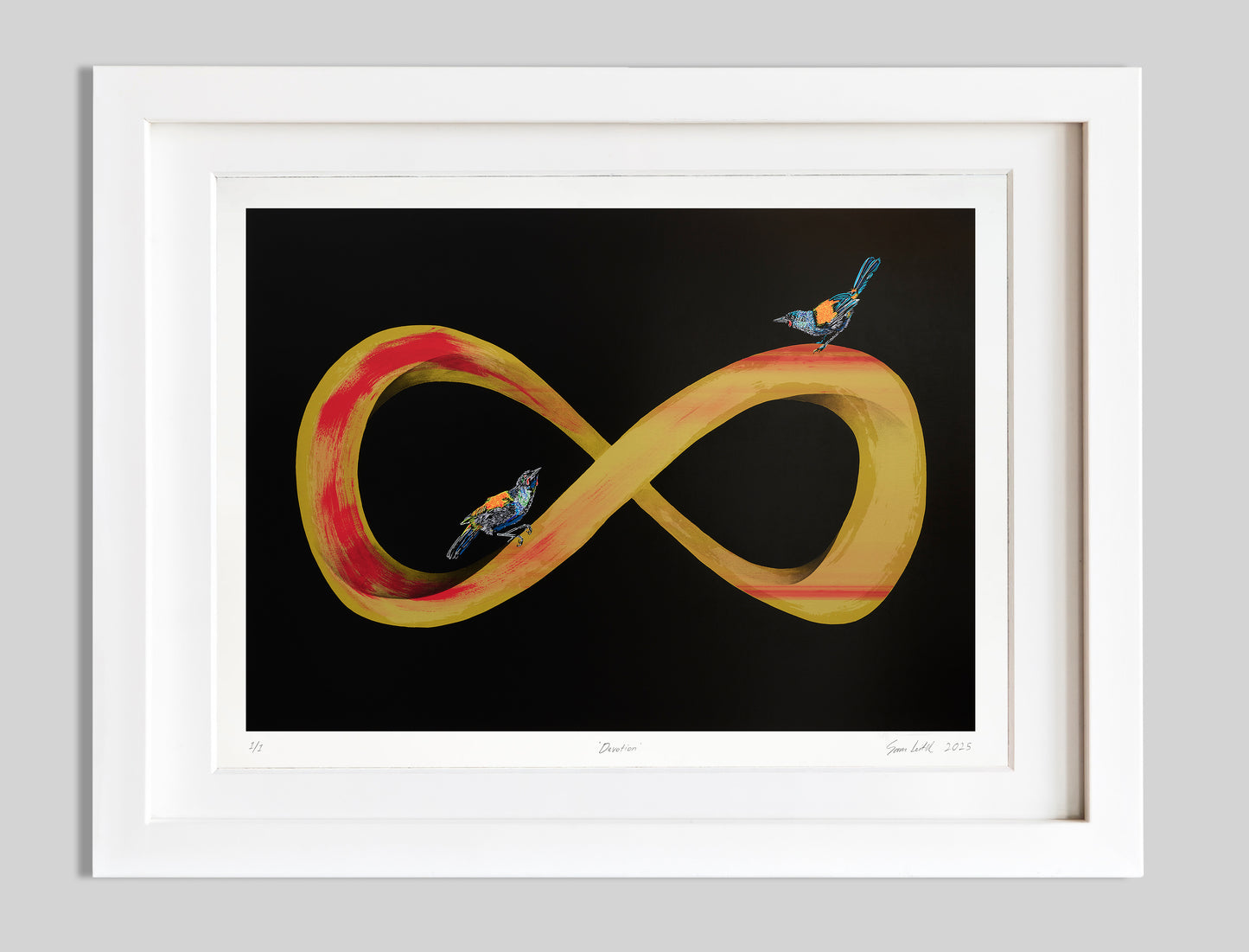 Gold and red infinity symbol with two tieke birds perched. Black background screen print with a white frame situated in a modern home setting.