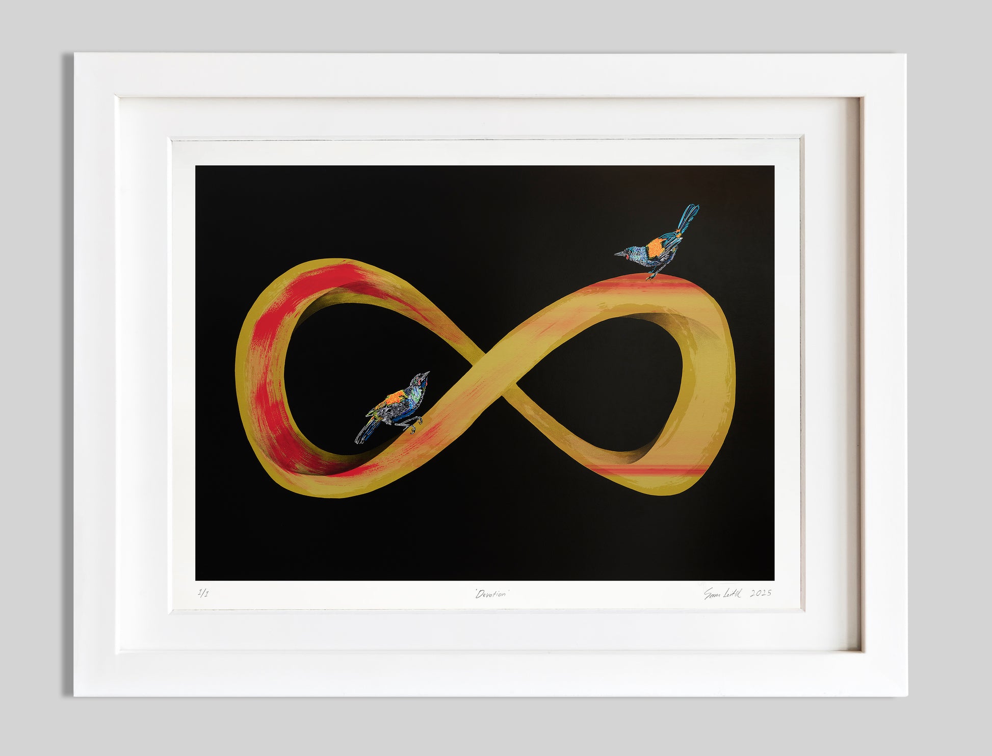 Gold and red infinity symbol with two tieke birds perched. Black background screen print with a white frame situated in a modern home setting.